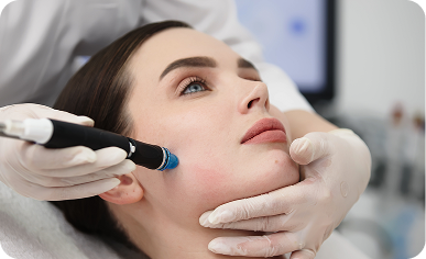Aesthetician performing a HydraFacial treatment on a relaxed patient.