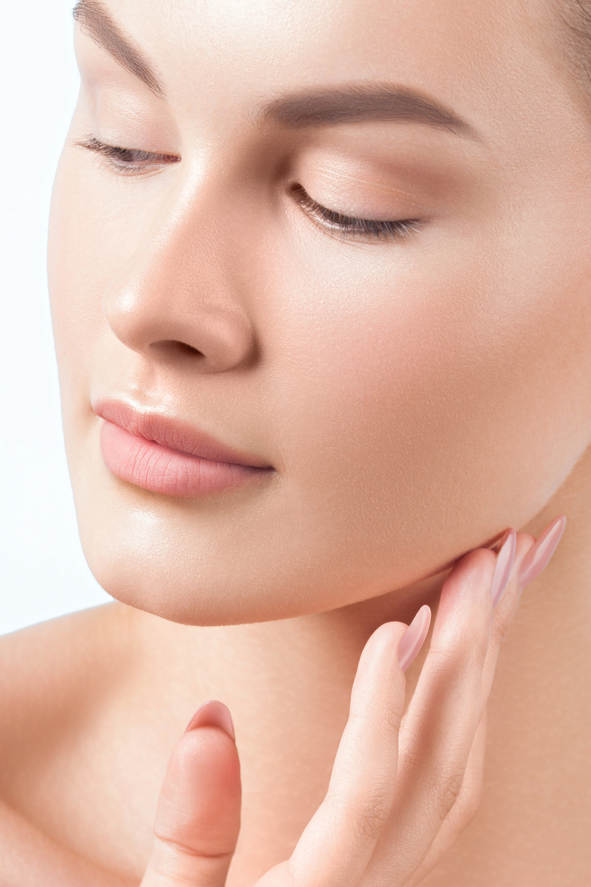 Woman with smooth, bright skin after dermaplaning at Desert Med Rejuvenation.
