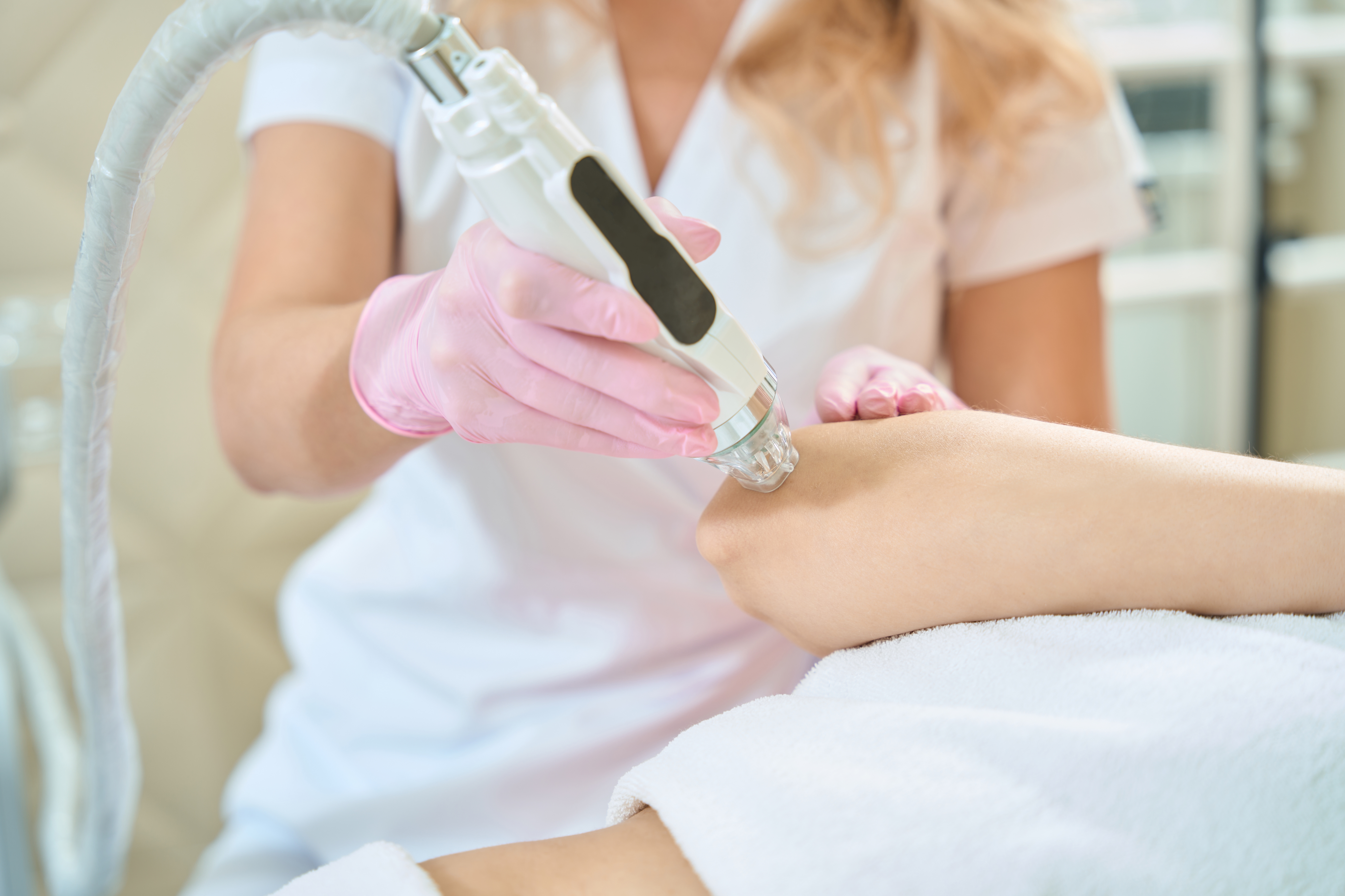RF Microneedling device being used on a patient’s face at Desert Med Rejuvenation.